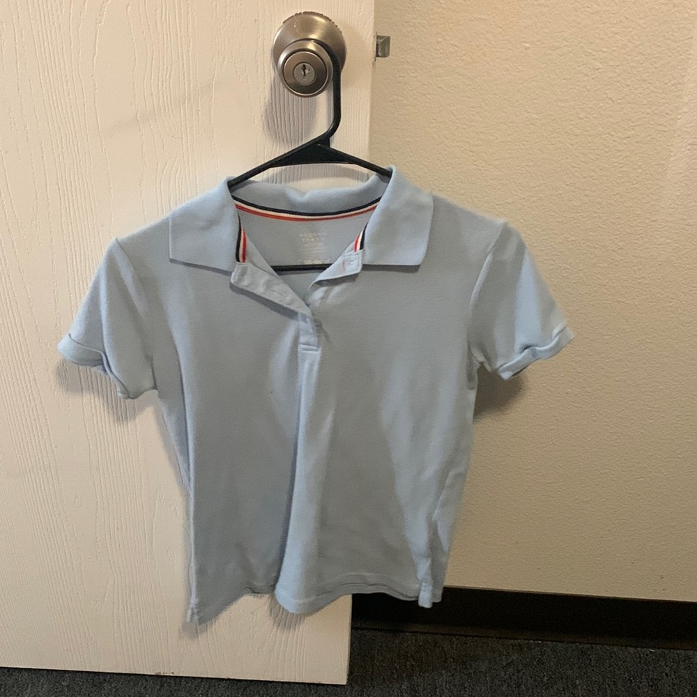 Light blue button down tee. Size XL. Brand: French Toast